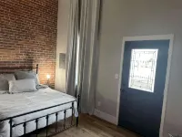 Stylish & Modern 2-Bdrm Apt in Downtown Warsaw featuring an urban rooftop deck.