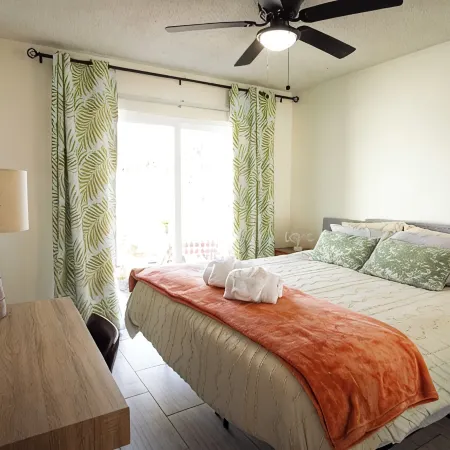 Steps to Beach & Shops - King Suite - Private Patio & Grill + Parking