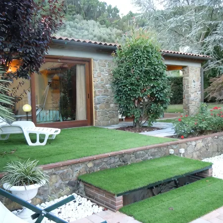 House with large veranda, garden and swimming pool