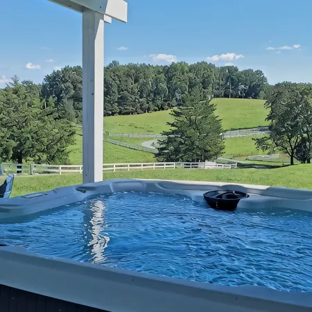 Cowboy hide-a-way cottage with hot tub on historic farm close to everything