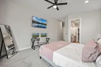 Game Room • Heated Pool & Spa • Fire Pit • Putting Green • Outdoor TV