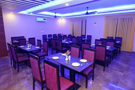 ExpoMart Inn Отели рядом с достопримечательностью «Knowledge Park II»