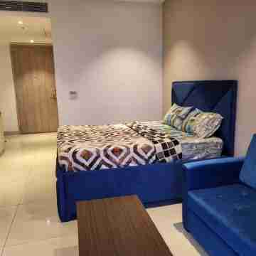 BnBBuddy Modern Studio with AC and WiFi in charming Gurugram Rooms