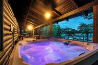 Cabin on 35 acres w/private lake for fishing, fenced yard, hot tub, pool table