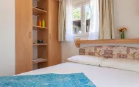 Camping Village Capo d'Orso - balcony