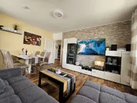 Bright and modern apartment on the ground floor in the center