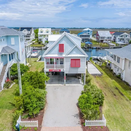 Waterfront; Golf Cart option; hot tub; Kayaks; Peddle Boat; Walk to beach; Ramp