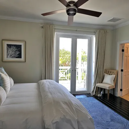 Luxury Beach side escape, steps from private beach, restaurant, marina, and café