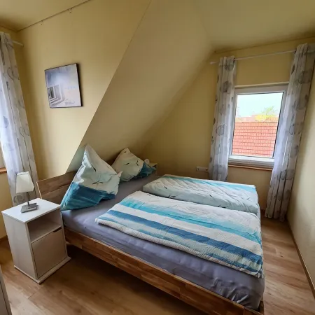 Apartment lighthouse at the sandy beach-balcony-2 double-bedroom-balcony-dogs on request