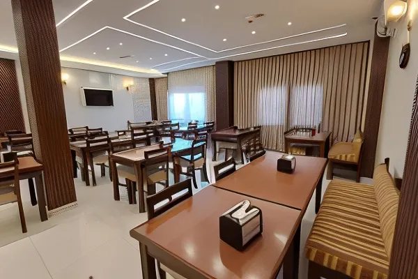 A view of the elegant dining area at Rumman Hotel