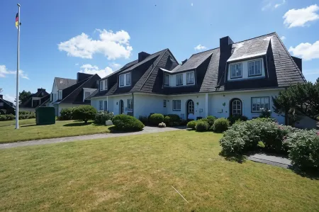 Ferienwohnung Sönshörn Отели в г. Munkmarsch