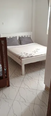 It's an apartment with necessary amenities including a gym