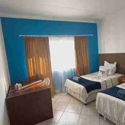 Charming peaceful 2-bedroomed unit with 180 degree panoramic view of Windhoek. Rooms