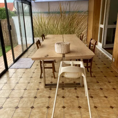 Pleasant house in quiet neighborhood with garage and fenced garden.