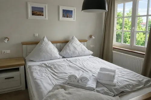 Bright apartment with direct access to the garden