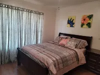 Affordable Family Getaway Palm Breeze Vacation Home - 2 ดาว