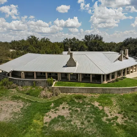 10,000 Sq.Ft Lux Estate on 650 Acres with Amazing Pool, Spa & Hill Country Views