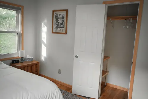 Remodeled home in the woods, just past city limits. With horse pasture nearby!