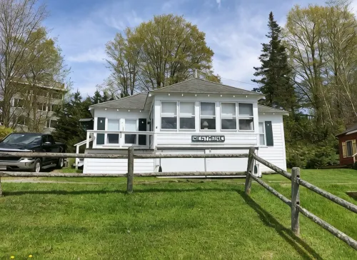 Charming cottage on Lake Willoughby w/ sun porch, private deck and dock.