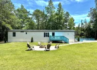 Cozy Beach Home w/ Fire Pit, Grill & Outdoor Swings— Min from Surf City Pier!