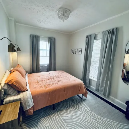 2-bedroom apartment in downtown Elkins with AC, a balcony, and WiFi.
