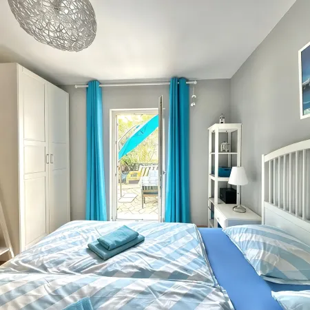 Apartment Didi with private garden, close to the center, family-friendly
