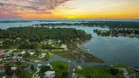 Paradise Waterfront Retreat – 5  | Elevator | Dock + Decks, Boat Access - 4-Star