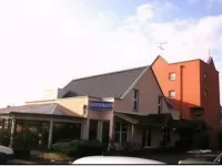 Kyriad Direct Lure Hotel dekat Chapelle Notre-Dame du Haut