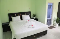 The Aquina House Hotels near Warung Enur Endim