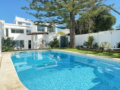 Luxury Villa Steps from the Beach | Heated Pool, Ocean Views & Rooftop Lounge