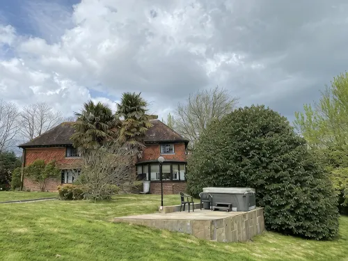 Hidden gem with hot tub  and tennis court in idyllic East Sussex  countryside .