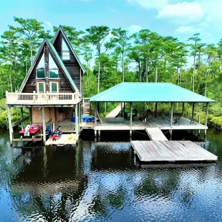 Secluded cabin on the water with jetski, hottub & kayak! Pets OK & early checkin