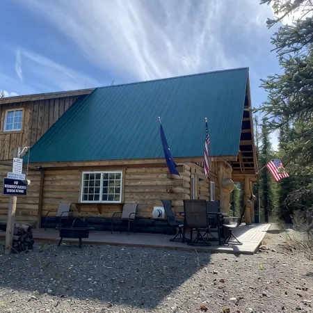 Log House on Denali Airstrip at Mile Post 229.5 of the Parks Highway.