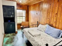 The Stone Schoolhouse - Gated Lakefront Acreage with views and historic charm