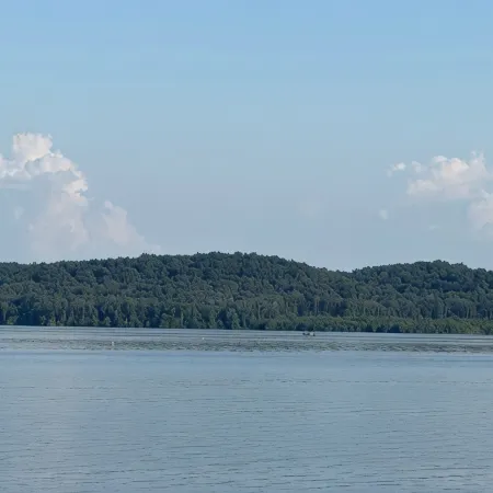 TAKE IT EASY Fishing Cabin. Large enclosed bay for storing the boat.