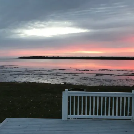 Wake up to the Sunrise in This Renovated Ocean-front Cottage!!