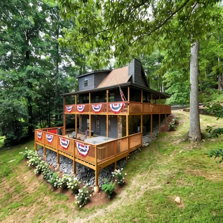Lakefront Home & Guest House with Two Docks, and Breathtaking Mountain Views!
