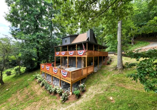 Lakefront Home & Guest House with Two Docks, and Breathtaking Mountain Views! - Mountain view
