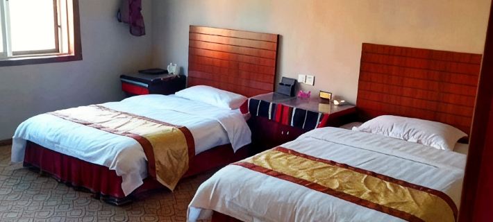 Ximeng Lai Nongbird Folk Inn โรงแรมในซีเหมิง