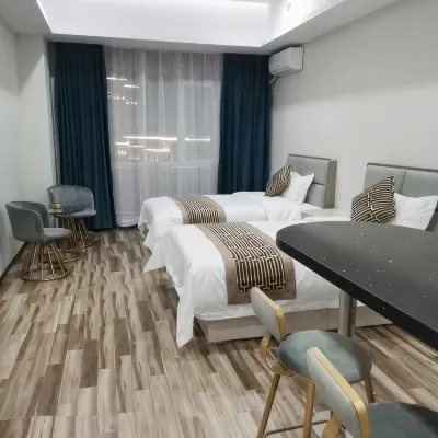 Hohhot Tuge Apartment โรงแรมใกล้ห้องสมุดซินเฉิง