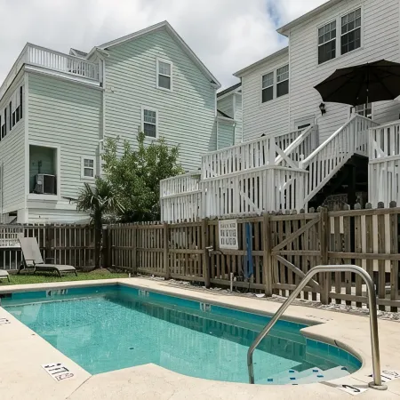 Island House D : Stylish Updated Townhome - Steps to the Beach w/ Pool!