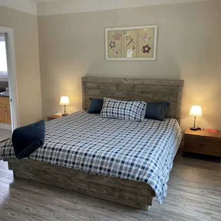 Spacious bungalow with large backyard and garage close to West Ed Mall