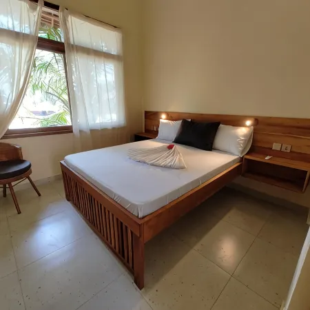 Oceanfront Retreat in Jambiani, Tanzania - Private Room with Balcony