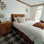 OLD SMIDDY APARTMENT, BALLOCH, LOCH LOMOND SLEEPS 3 IN FAMILY ROOM -  Privatzimmer