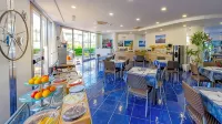 Astro Suite Hotel - Aamiainen
