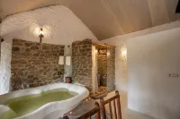 Deshadan Eco Valley Resort - An Eco Friendly Mud House Hôtels à : Keezhanthoor