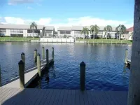 Beautiful open sunny Condo on waterfront dock with Gulf access in  Cape Coral Fl