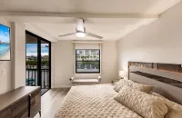 Vanderbilt Beach Condo, Bay Views, New Saltwater Pool, Walk to Beach