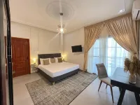 Lighthouse Signature Suites - Homestays