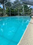 CAPTAIN’S QUARTERS Tropical pool house. Airport, Beaches, Usssa sports complex - ติดทะเล